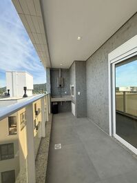 Two-suite apartment with partial sea view.