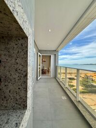 Two-suite apartment with partial sea view.