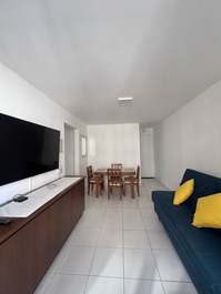 Sala com sofá cama 