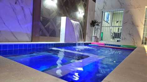 Piscina com aquecimento (opcional), led, cascata, hidromassagem, caminhos de luz