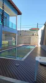 Casa alto padrão praia das palmeiras 4 dor. piscina ar
