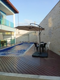 Casa alto padrão praia das palmeiras 4 dor. piscina ar