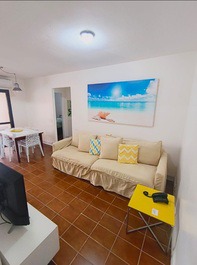 Sala com sofá chaise
